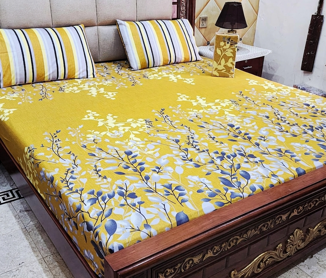 Yellow Floral Cotton Bedspread with Striped Pillows