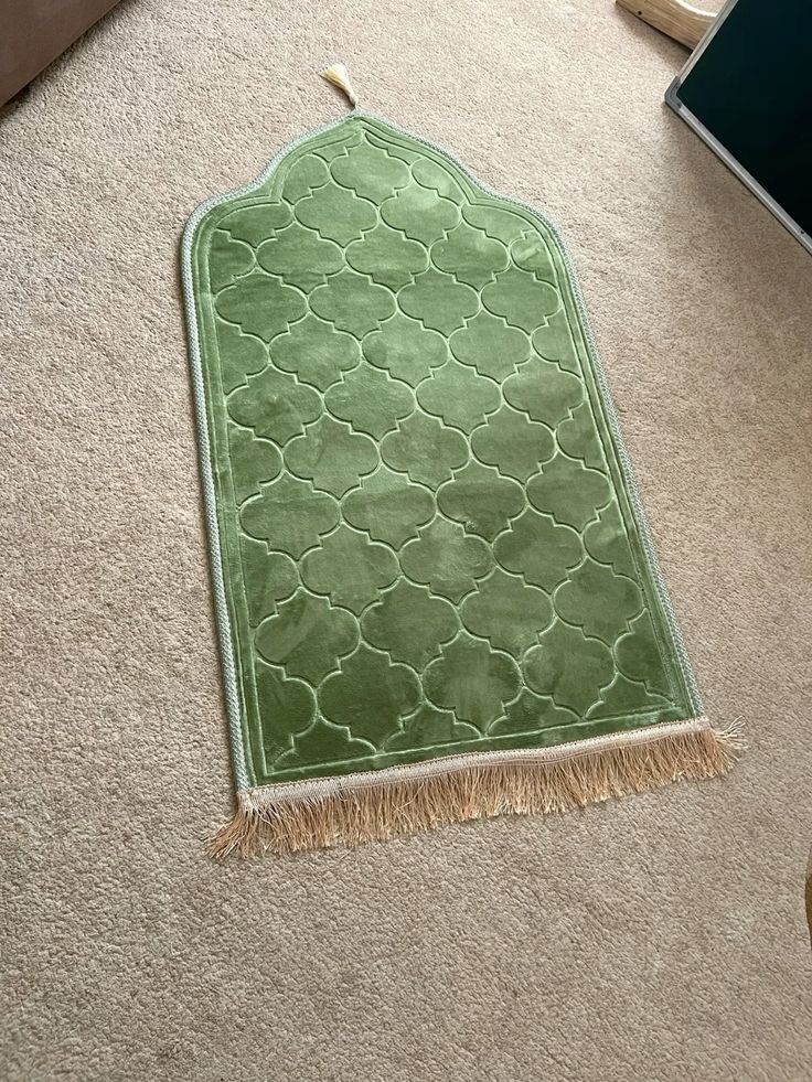 green prayer mat